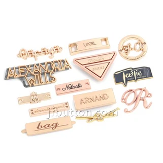 Металеві бирки для сумок